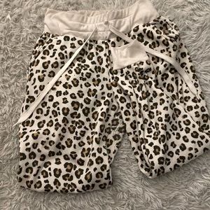 White, black, and light brown cheetah print love streak joggers size small